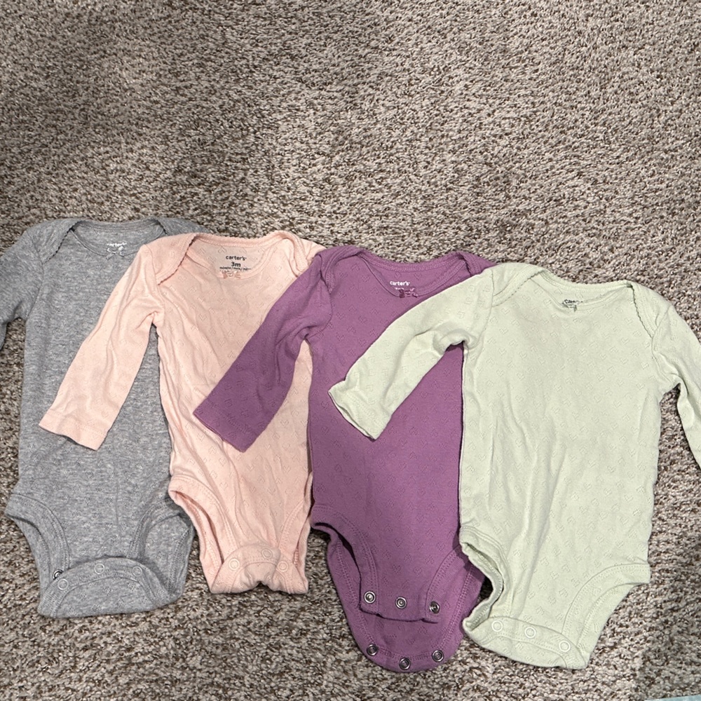 Set of Four Long Sleeve Baby Onesies